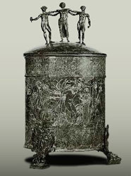Ficoroni cist

Bronze ritual vessel from women's Dionysiac procession featuring homoerotic symbols and engraved with scenes from the voyage of the Argo. The feet depict Hercules and Iolaus, with Eros standing in between. The finial group is made up of Dionysus flanked by two ithyphallic (sexually aroused) satyrs. One side of the engraving shows an embracing couple tentatively identified as Hercules and Hylas (closeup of engraving has been enhanced for clarity). 

Praeneste, 4th century BCE.
Museo Nazionale di Villa Giulia, 
Rome.