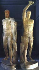 Harmodius and Aristogiton

Marble and porphyry, Roman copy of a Greek 
original. The fighters hold a sword
in each hand, only the hilts of which remain.

Museo Archeologico Nazionale, Napoli.